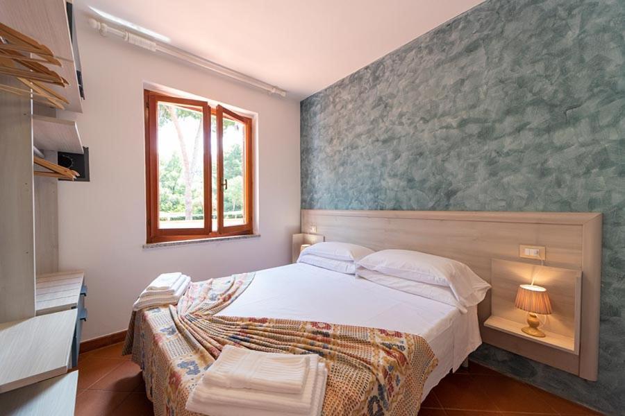 Residence Le Grazie Est Каполивери Экстерьер фото