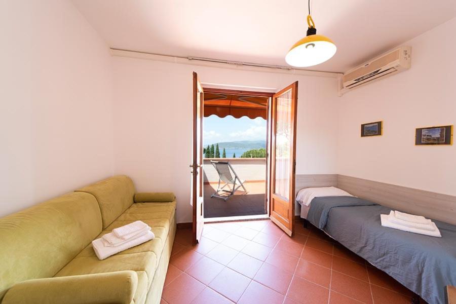 Residence Le Grazie Est Каполивери Экстерьер фото